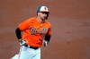 Baltimore Orioles' Trey Mancini runs the bases after hitting a solo home run off Boston Red Sox starting pitcher Garrett Richards during the first inning of a baseball game, Saturday, April 10, 2021, in Baltimore. (AP Photo/Julio Cortez)