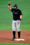 Miami Marlins' Francisco Cervelli gestures as he stands on second with a double during the third inning of a baseball game against the Baltimore Orioles, Thursday, Aug. 6, 2020, in Baltimore. (AP Photo/Nick Wass)