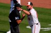 Baltimore Orioles manager Brandon Hyde, right, argues with home plate umpire Jeremie Rehak after the umpire ejected Hyde during the fourth inning of a baseball game, Thursday, April 8, 2021, on Opening Day in Baltimore. Hyde argued against a call on a pitch from Red Sox's Eduardo Rodriguez that hit Orioles' Rio Ruiz but wasn't awarded first base on a check swing strike. (AP Photo/Julio Cortez)