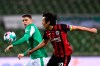 Frankfurt's defender Makoto Hasebe, right, and Bremen's striker Milot Rashica, left, compete for the ball, during the German Bundesliga soccer match between Werder Bremen and Eintracht Frankfurt at Wohninvest Weserstadion in Bremen, Germany, Friday, Feb. 26, 2021. (Carmen Jaspersen/dpa via AP)