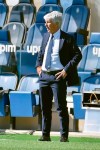 Atalanta's coach Gian Piero Gasperini follow the action during a Serie A soccer match between Atalanta and Cagliari, in Bergamo's Gewiss stadium, northern Italy, Sunday, Oct. 4, 2020. (Gianluca Checchi/LaPresse via AP)
