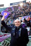 Fiorentina president Rocco Commisso salutes prior to the start of an Italian Serie A soccer match between Bologna and Fiorentina, at the Renato Dall'Ara stadium in Bologna, Italy, Monday, Jan. 6, 2020. ( Massimo Paolone/LaPresse via AP)