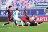 Bologna's Takehiro Tomiyasu, left, scores an own goal during the Serie A soccer match between Bologna and Sassuolo at the Renato Dall'Ara Stadium in Bologna, Italy, Sunday, Oct. 18, 2020. (Filippo Rubin/LaPresse via AP)