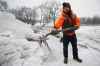 JOHN WOODS / WINNIPEG FREE PRESS
Wolseley residents Brad Hignell, pictured, and Chris Beauvilain took matters into their own hands after the city closed the Omand’s Creek footbridge to pedestrians. They shovelled the snow and ice from the bridge themselves by hand.