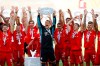 Munich's team captain Manuel Neuer lifts the trophy after the German Bundesliga soccer match between VfL Wolfsburg and FC Bayern Munich in Wolfsburg, Germany, Saturday, June 27, 2020. Bayern wins the 8th straight Bundesliga title. (Kai Pfaffenbach/Pool Photo via AP)
