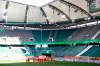 Munich's players celebrate in front of the empty stands after the German Bundesliga soccer match between VfL Wolfsburg and FC Bayern Munich in Wolfsburg, Germany, Saturday, June 27, 2020. Bayern wins the 8th straight Bundesliga title. (Kai Pfaffenbach/Pool Photo via AP)