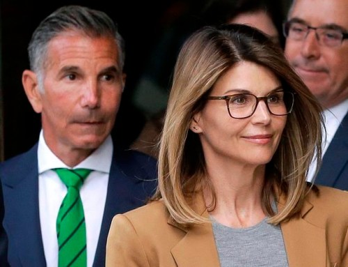 FILE - In this April 3, 2019 file photo, actress Lori Loughlin, front, and husband, clothing designer Mossimo Giannulli, left, depart federal court in Boston after facing charges in a nationwide college admissions bribery scandal. The famous couple pleaded guilty to charges in May 2020, and are scheduled to be sentenced on Friday, Aug. 21, 2020. (AP Photo/Steven Senne, File)