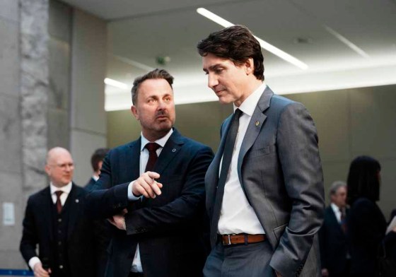 CPPrime Minister Xavier Bettel (left) of Luxembourg speaks with Canadian Prime Minister Justin Trudeau at NATO headquarters in Brussels today. (Thibault Camus / The Associated Press)
