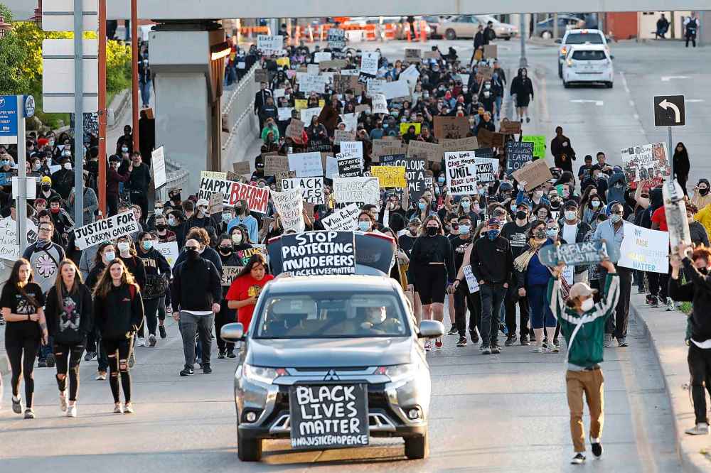 CP
People march in solidarity with the George Floyd protests across the United States in Winnipeg, Friday, June 5, 2020. THE CANADIAN PRESS/John Woods