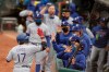 Texas Rangers' Shin-Soo Choo (17) celebrates after hitting a home run against the Oakland Athletics in the first inning of a baseball game Wednesday, Aug. 5, 2020, in Oakland, Calif. (AP Photo/Ben Margot)
