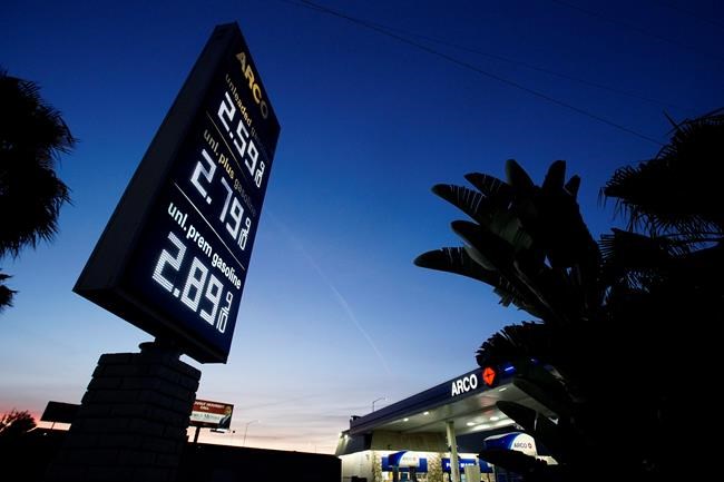 An Arco service station displays the price of three grades of gasoline Thursday, May 7, 2020, in Santa Ana, Calif. (AP Photo/Chris Carlson)