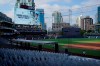 A display in honor of Whitey Ford, who died Thursday night, is seen during a moment of silence before Game 5 of a baseball AL Division Series between the Tampa Bay Rays and the New York Yankees, Friday, Oct. 9, 2020, in San Diego. (AP Photo/Gregory Bull)