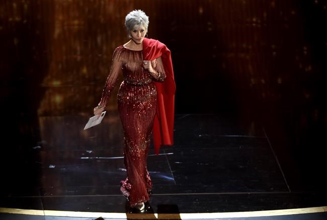 Jane Fonda appears on stage to present the award for best picture at the Oscars on Sunday, Feb. 9, 2020, at the Dolby Theatre in Los Angeles. (AP Photo/Chris Pizzello)