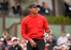 Tiger Woods watches his tee shot on the first hole of the South Course at Torrey Pines Golf Course during the final round of the Farmers Insurance Open golf tournament Sunday Jan. 26, 2020, in San Diego. (AP Photo/Denis Poroy)