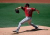 Arizona Diamondbacks starting pitcher Taylor Widener winds up during the first inning of the team's baseball game against San Diego Padres on Sunday, April 4, 2021, in San Diego. (AP Photo/Denis Poroy)