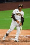 San Diego Padres' Trent Grisham tosses his bat after hitting a solo home run off Los Angeles Dodgers starting pitcher Clayton Kershaw in the sixth inning of a baseball game Monday, Sept. 14, 2020, in San Diego. (AP Photo/Derrick Tuskan)