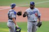Los Angeles Dodgers relief pitcher Pedro Baez is congratulated by catcher Will Smith after the Dodgers defeated the San Diego Padres in a baseball game Wednesday, Sept. 16, 2020, in San Diego. (AP Photo/Derrick Tuskan)