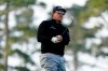 Phil Mickelson follows his approach shot to the 10th green of the Spyglass Hill Golf Course during the first round of the AT&T Pebble Beach Pro-Am golf tournament, Thursday, Feb. 11, 2021, in Pebble Beach, Calif. (AP Photo/Eric Risberg)