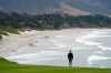 Patrick Cantlay looks out at the ocean while walking down the ninth fairway of the Pebble Beach Golf Links during the first round of the AT&T Pebble Beach Pro-Am golf tournament, Thursday, Feb. 11, 2021, in Pebble Beach, Calif. (AP Photo/Eric Risberg)