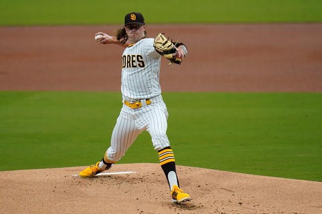 San Diego Padres starting pitcher Chris Paddack works against a San Francisco Giants batter during the first inning of a baseball game Thursday, Sept. 10, 2020, in San Diego. (AP Photo/Gregory Bull)