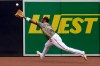 San Diego Padres left fielder Jurickson Profar makes the catch for the out on San Francisco Giants' Mike Tauchman during the first inning of a baseball game Sunday, May 2, 2021, in San Diego. (AP Photo/Gregory Bull)
