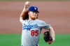 Los Angeles Dodgers starting pitcher Dustin May works against a San Diego Padres batter during the first inning of a baseball game Tuesday, Aug. 4, 2020, in San Diego. (AP Photo/Gregory Bull)