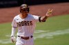 San Diego Padres' Manny Machado reacts after hitting a home run during the fourth inning of a baseball game against the Seattle Mariners, Thursday, Aug. 27, 2020, in San Diego. (AP Photo/Gregory Bull)