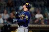 Milwaukee Brewers' Luis Urias looks skyward after hitting a home run during the third inning of a baseball game against the San Diego Padres, Monday, April 19, 2021, in San Diego. (AP Photo/Gregory Bull)