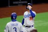 Los Angeles Dodgers' Joc Pederson reacts after hitting a three-run home run during the sixth inning of a baseball game against the San Diego Padres, Wednesday, Aug. 5, 2020, in San Diego. (AP Photo/Gregory Bull)