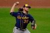 Milwaukee Brewers starting pitcher Corbin Burnes works against a San Diego Padres batter during the first inning of a baseball game Tuesday, April 20, 2021, in San Diego. (AP Photo/Gregory Bull)