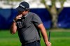 Patrick Reed reacts after missing a putt on the 16th hole of the South Course during the third round of the Farmers Insurance Open golf tournament at Torrey Pines, Saturday, Jan. 30, 2021, in San Diego. (AP Photo/Gregory Bull)