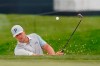 Bryson DeChambeau hits from a bunker to the first green during practice for the PGA Championship golf tournament at TPC Harding Park in San Francisco, Tuesday, Aug. 4, 2020. (AP Photo/Jeff Chiu)