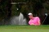 Rory McIlroy, of Northern Ireland, hits out of a bunker to the 13th green on the South Course during the final round of the Farmers Insurance Open golf tournament at Torrey Pines, Sunday, Jan. 31, 2021, in San Diego. (AP Photo/Gregory Bull)