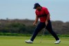 Patrick Reed reacts after making his putt for par on the 14th hole on the South Course during the final round of the Farmers Insurance Open golf tournament at Torrey Pines, Sunday, Jan. 31, 2021, in San Diego. (AP Photo/Gregory Bull)