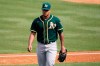 Oakland Athletics pitcher Frankie Montas walks to the dugout after being relieved during the fourth inning of Game 4 of a baseball American League Division Series against the Houston Astros in Los Angeles, Thursday, Oct. 8, 2020. (AP Photo/Marcio Jose Sanchez)