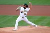 Oakland Athletics' Sean Manaea throws to a Tampa Bay Rays batter during the first inning of a baseball game in Oakland, Calif., Friday, May 7, 2021. (AP Photo/Jed Jacobsohn)