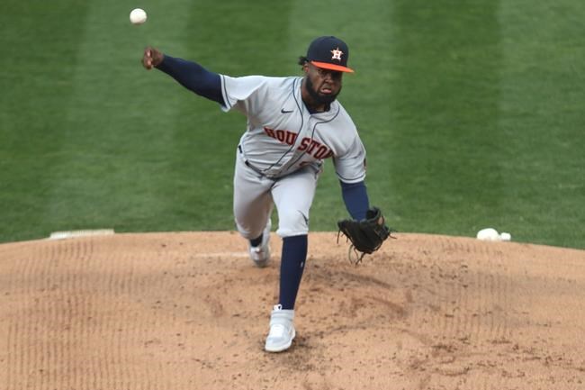 Houston Astros' Cristian Javier throws against the Oakland Athletics during the first inning of a baseball game in Oakland, Calif., Monday, Sept. 7, 2020. (AP Photo/Jed Jacobsohn)