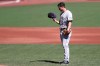 Colorado Rockies' Chi Chi González looks at his hat after allowing two runs in the first inning against the San Francisco Giants during the second inning of a baseball game in San Francisco, Thursday, Sept. 24, 2020. (AP Photo/Jed Jacobsohn)