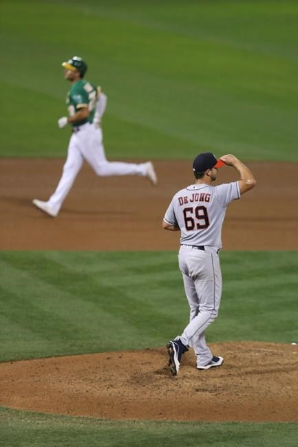 Oakland Athletics' Matt Olson rounds the bases after hitting a three-run home run off of Houston Astros' Chase De Jong during the third inning of the second baseball game of a doubleheader in Oakland, Calif., Tuesday, Sept. 8, 2020. (AP Photo/Jed Jacobsohn)