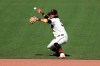 San Francisco Giants' Brandon Crawford attempts to field a single by Colorado Rockies' Kevin Pillar during the seventh inning of a baseball game in San Francisco, Thursday, Sept. 24, 2020. (AP Photo/Jed Jacobsohn)