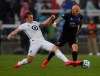 San Jose Earthquakes' Magnus Eriksson (7) keeps the ball away from Minnesota United FC's Robin Lod, left, in the first half of an MLS soccer match in San Jose, Calif., Saturday, March 7, 2020. (Nhat V. Meyer/Bay Area News Group via AP)