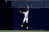 San Diego Padres center fielder Jorge Mateo is unable to make a catch for a two-run home run by San Francisco Giants' Darin Ruf during the second inning of a baseball game in San Diego, Wednesday, April 7, 2021. (AP Photo/Kelvin Kuo)