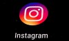 FILE - In this Nov. 29, 2018 file photo, the Instagram app logo is displayed on a mobile screen in Los Angeles. Though Black Out Tuesday was originally organized by the music community, the social media world went dark on Tuesday in support of the Black Lives Matter movement and the many killings of black people around the world that has caused outrage and protests. Instagram accounts, from top record label to everyday people, was full of black squares posted in response to the deaths of George Floyd, Ahmaud Arbery and Breonna Taylor. (AP Photo/Damian Dovarganes, File)