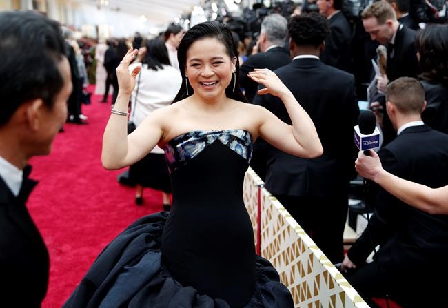 Kelly Marie Tran arrives at the Oscars on Sunday, Feb. 9, 2020, at the Dolby Theatre in Los Angeles. (AP Photo/John Locher)