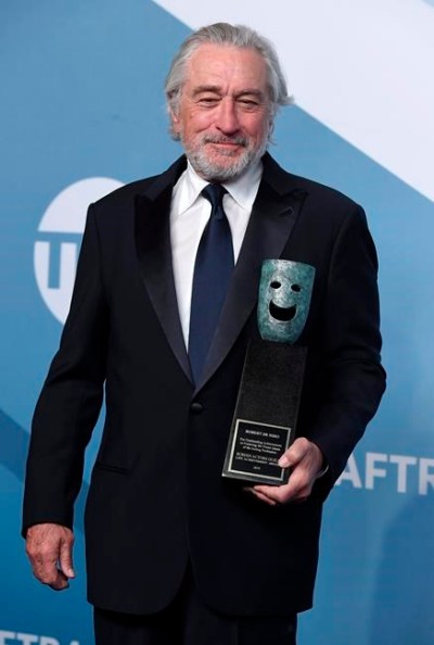 Robert De Niro poses in the press room with the lifetime achievement award at the 26th annual Screen Actors Guild Awards at the Shrine Auditorium & Expo Hall on Sunday, Jan. 19, 2020, in Los Angeles. (Photo by Jordan Strauss/Invision/AP)