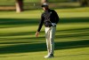 Sam Burns reacts after hitting his second shot on the 18th hole as third round play continues during the Genesis Invitational golf tournament at Riviera Country Club, Sunday, Feb. 21, 2021, in the Pacific Palisades area of Los Angeles. (AP Photo/Ryan Kang)