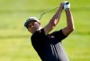Adam Scott, of Australia, hits his second shot on the second hole during the third round of the Genesis Invitational golf tournament at Riviera Country Club, Saturday, Feb. 15, 2020, in the Pacific Palisades area of Los Angeles. (AP Photo/Ryan Kang)