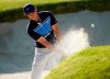 Rory McIlroy, of Northern Ireland, hits out of a bunker onto the 17th green during the final round of the Genesis Invitational golf tournament at Riviera Country Club, Sunday, Feb. 16, 2020, in the Pacific Palisades area of Los Angeles. (AP Photo/Ryan Kang)