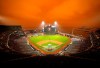 Smoke from California wildfires obscures the sky over Oracle Park as the Seattle Mariners take batting practice before their baseball game against the San Francisco Giants on Wednesday, Sept. 9, 2020, in San Francisco. People from San Francisco to Seattle woke Wednesday to hazy clouds of smoke lingering in the air, darkening the sky to an eerie orange glow that kept street lights illuminated into midday, all thanks to dozens of wildfires throughout the West. (AP Photo/Tony Avelar)