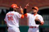 San Francisco Giants shortstop Brandon Crawford (35) and second baseman Donovan Solano, right, celebrate their victory over the Washington Nationals in a baseball game Sunday, July 11, 2021, in San Francisco. (AP Photo/Tony Avelar)